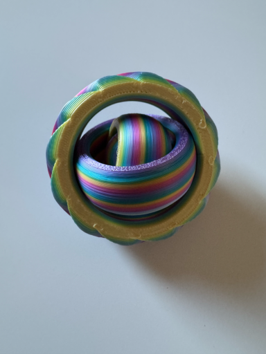 V05 - Regenboog ring fidget